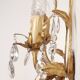 Hand-forged wall lamp gilded with gold leaf and crystals, Italy