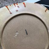 Dish and 4 plates in glazed stoneware orange color and pattern