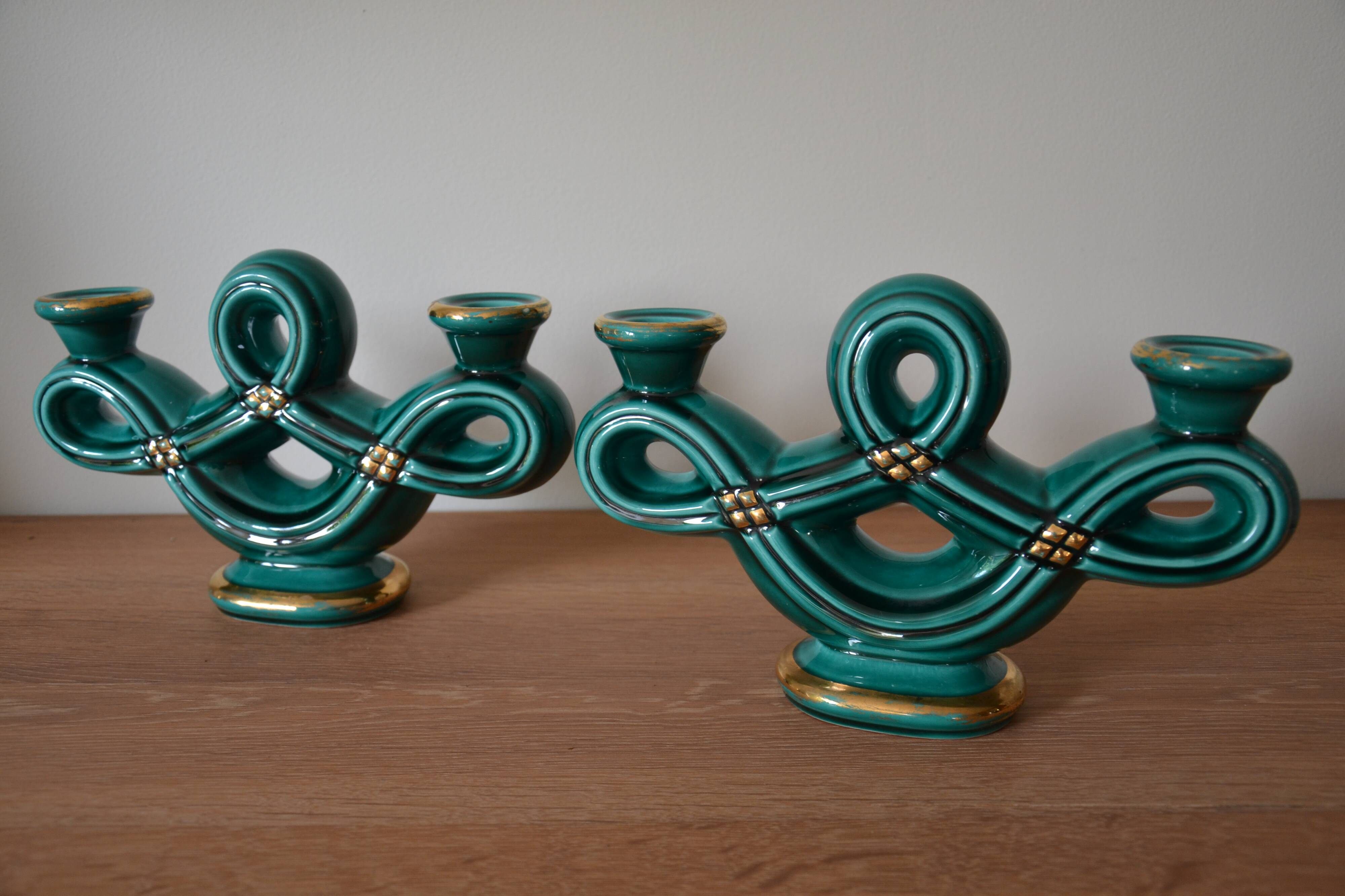 Two green ceramic candlesticks from the 1930s-1940s.