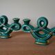 Two green ceramic candlesticks from the 1930s-1940s.