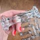 Set of 12 antique knife and fork rests in thick transparent glass.