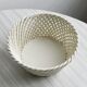 Bread basket - openwork white ceramic bowl.