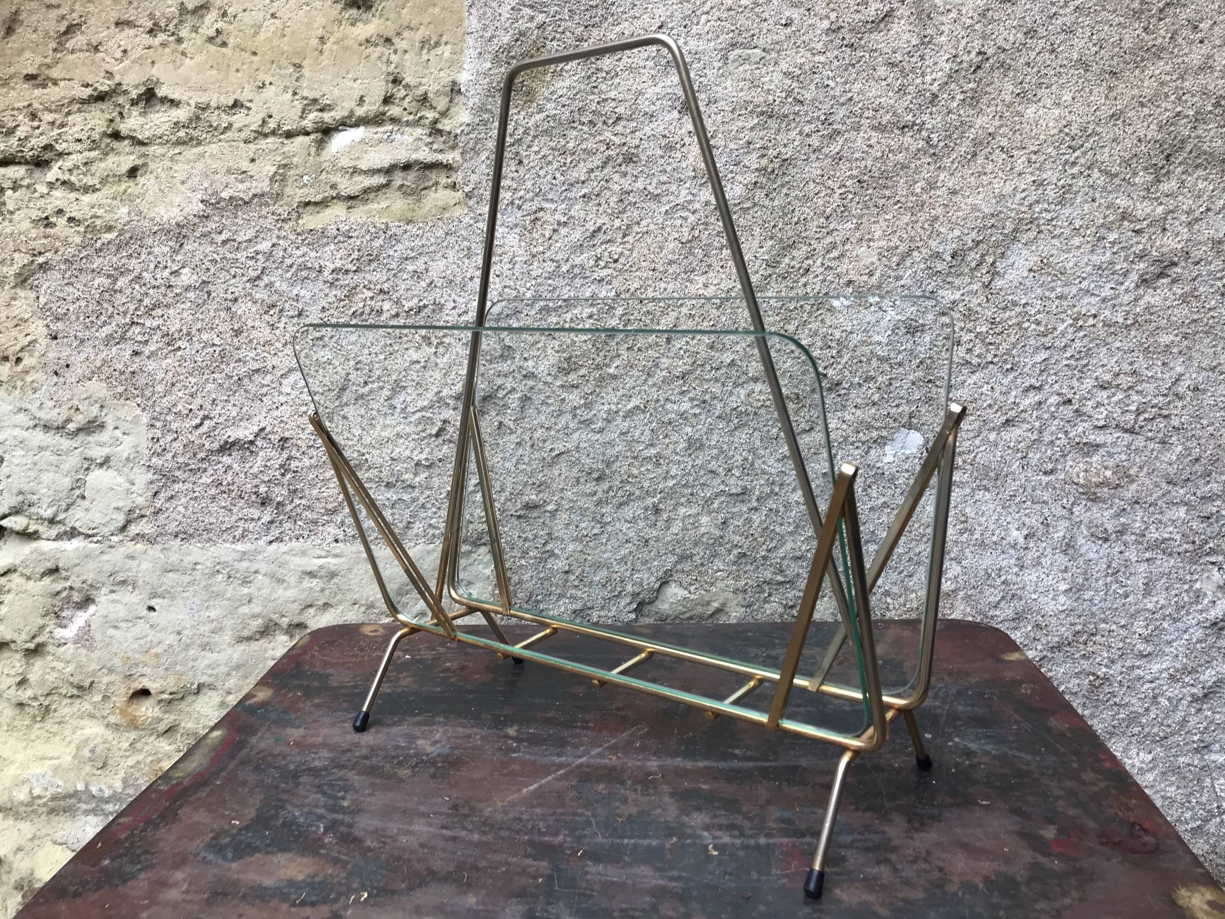 Glass and gold metal magazine door