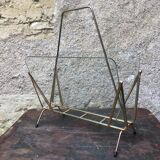 Glass and gold metal magazine door