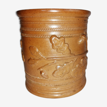 Varnished carved earth pot