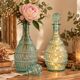 Pair of cut blown glass carafes in blue-green from the 19th century.