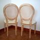 Paire de chaises médaillon à dossier cannage rotin
