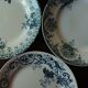A set of 4 flat plates Terre de fer mismatched blue