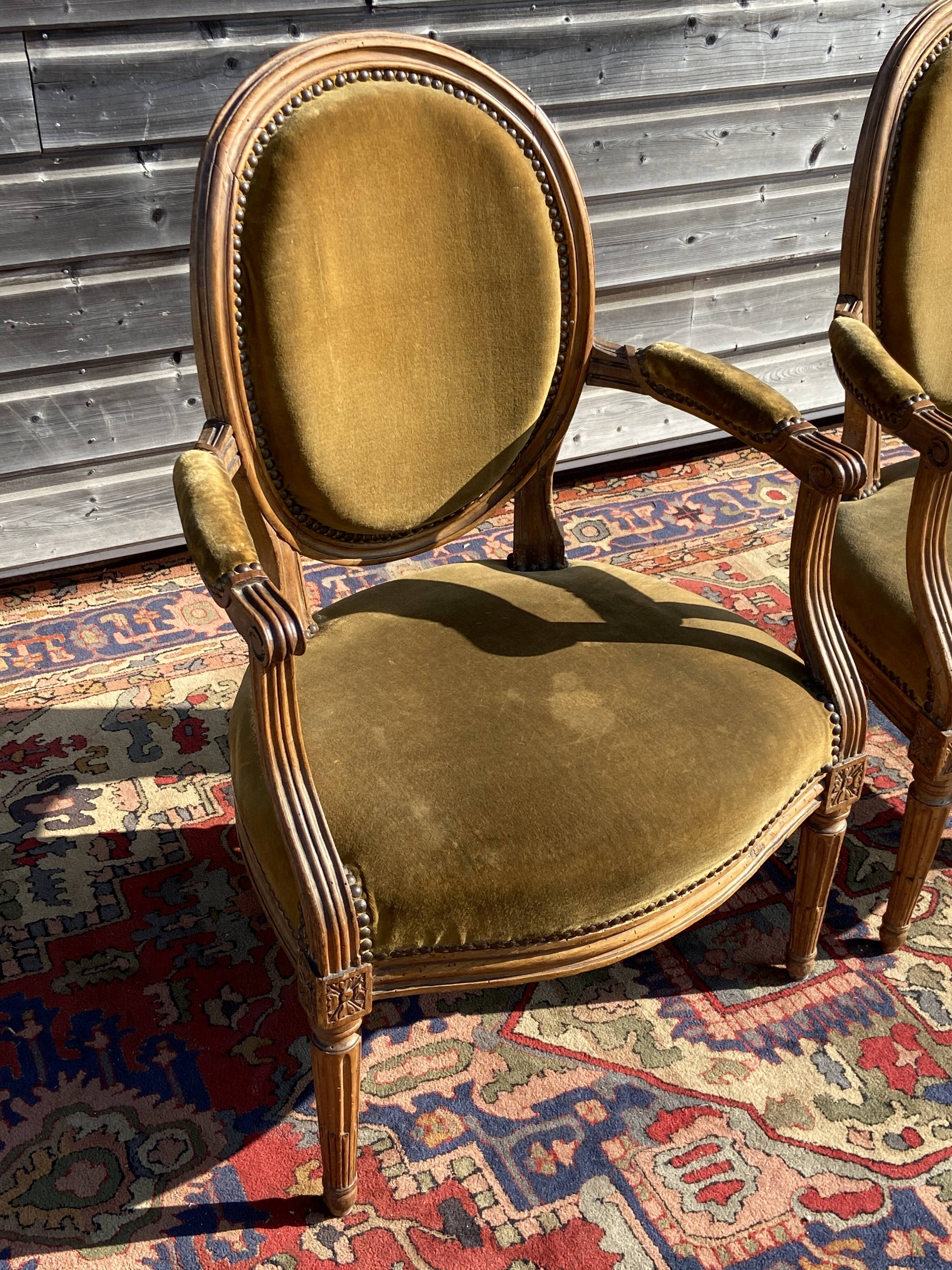 Pair of Louis XVI period medallion armchairs