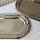 Set of 3 silver-plated trays with a very patinated finish.
