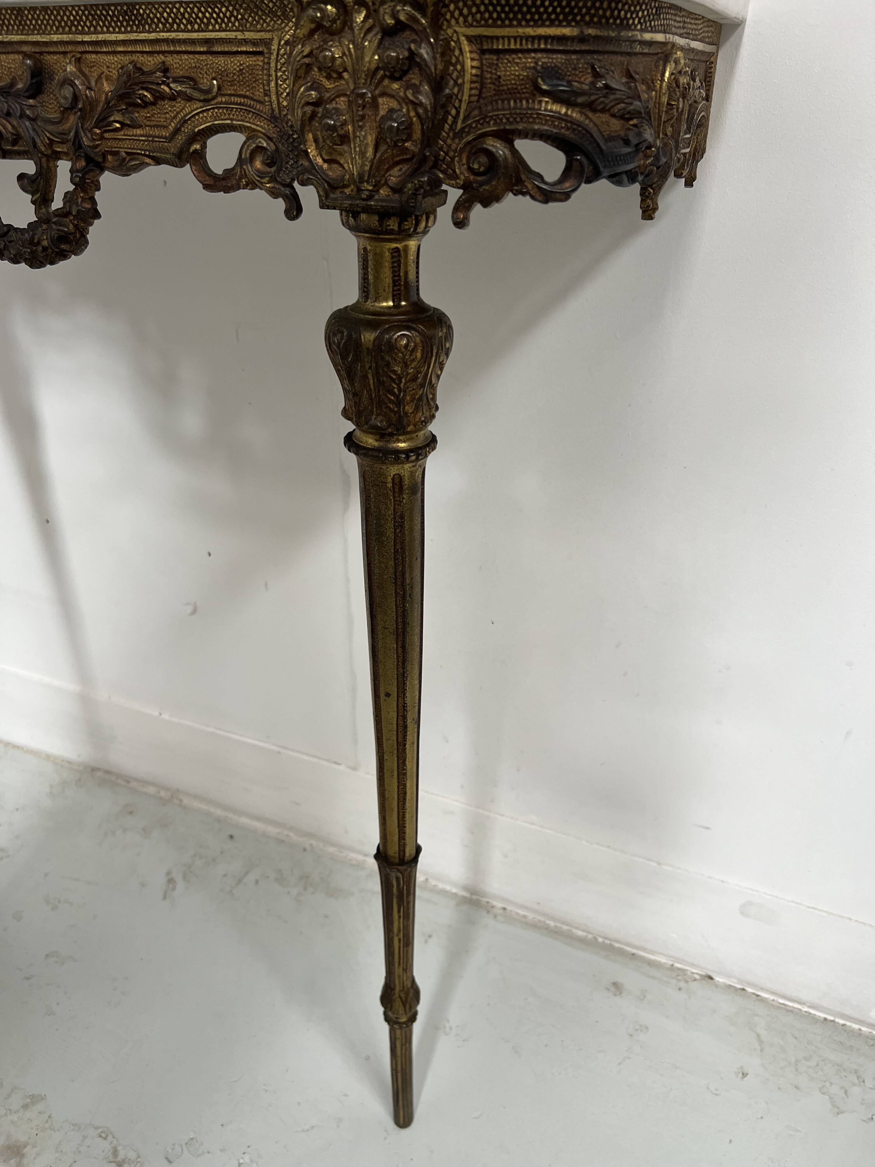 Louis XVI style console in gilded bronze, 20th century