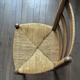 Set of 8 wooden chairs with rattan seats from the 1950s
