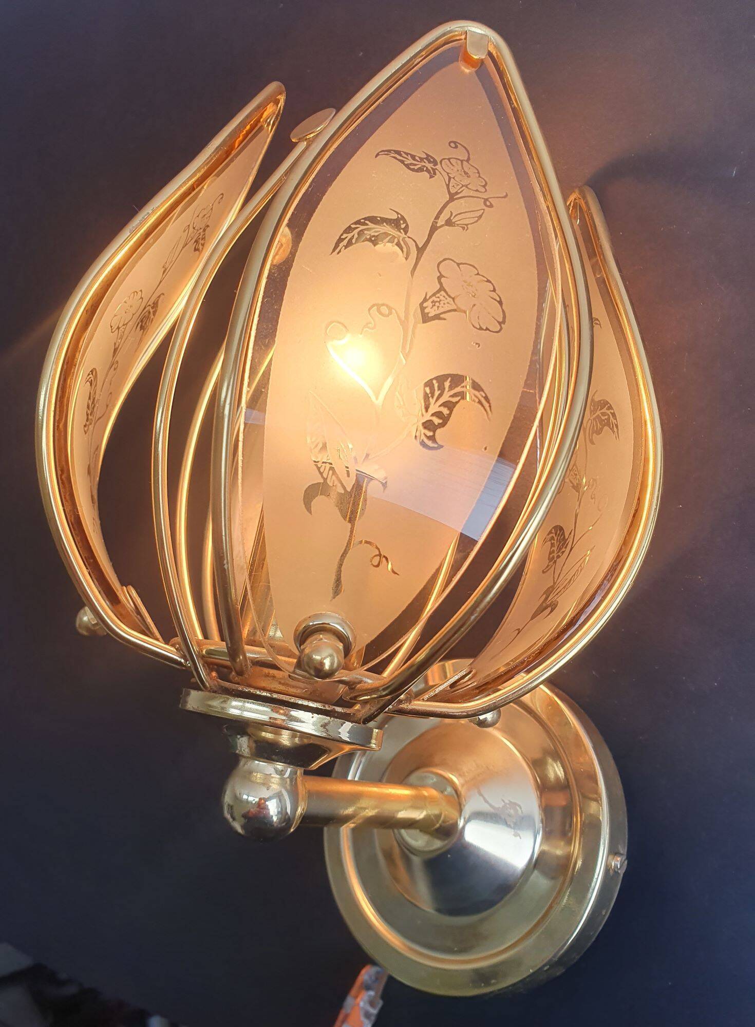 Pair of vintage brass wall sconces with glass shades