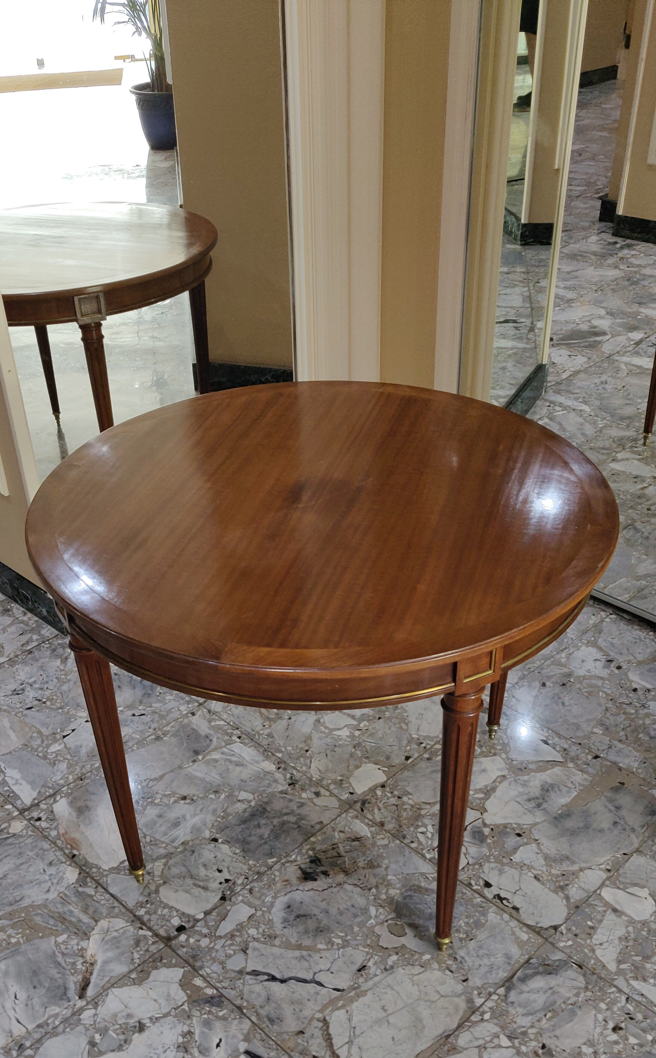 Louis XVI dining table in cherry and bronze