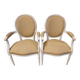 Paire de fauteuils médaillon style Louis XVI