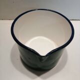 Old milk pitcher in enamelled sheet metal