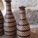 Wicker and leather bottle
