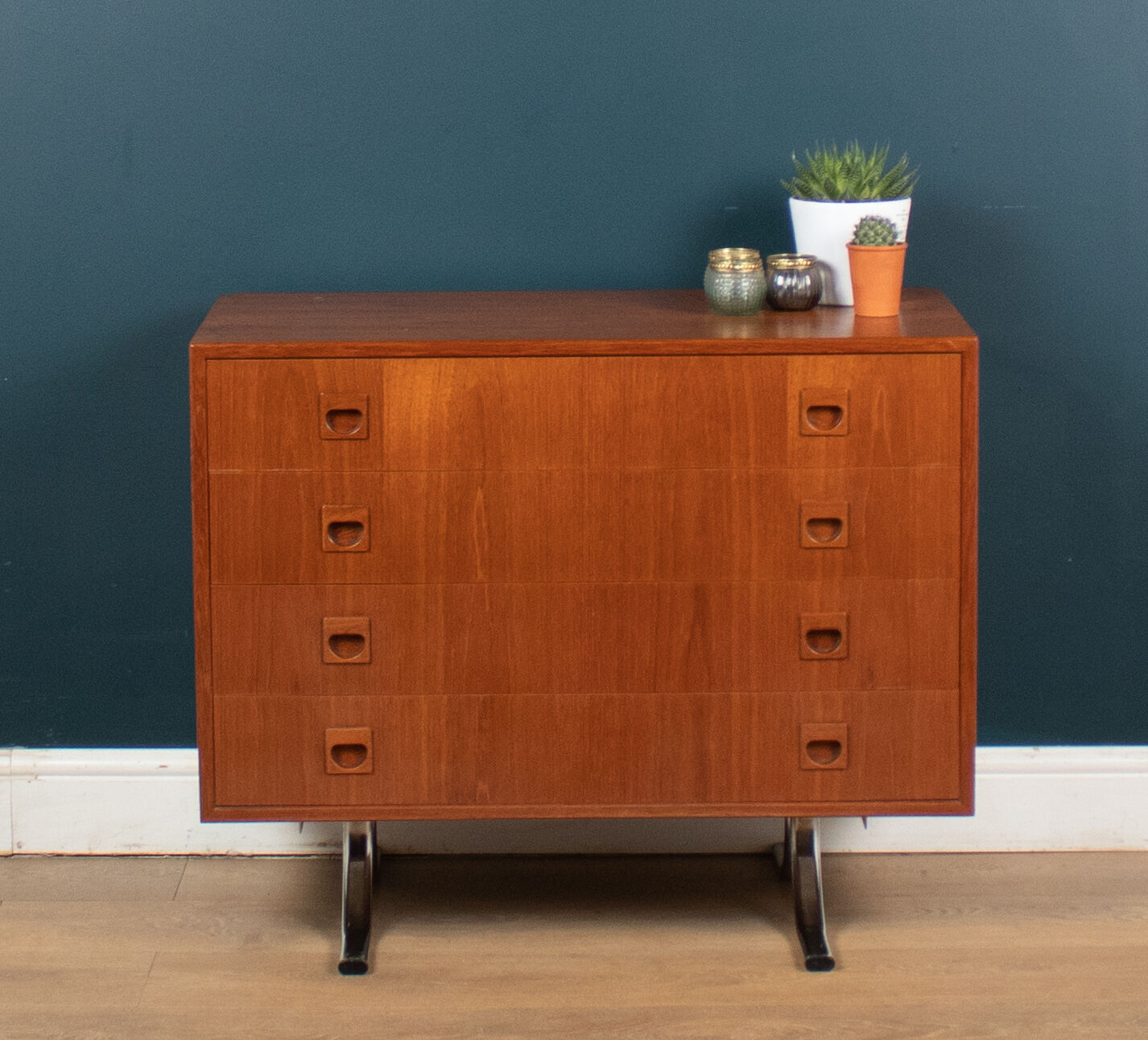 Retro teak 1960s danish chest of drawers on metal legs