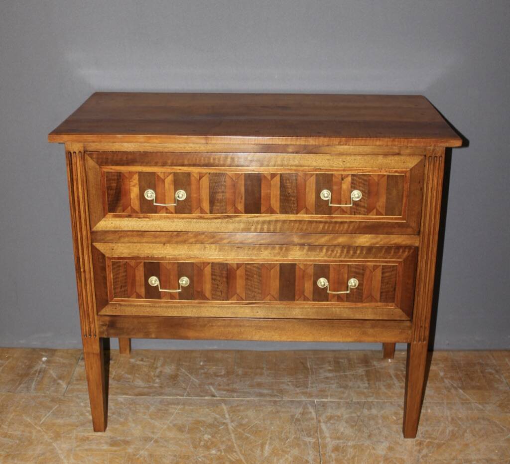 Louis XVI style chest of drawers in walnut and 19th century marquetry