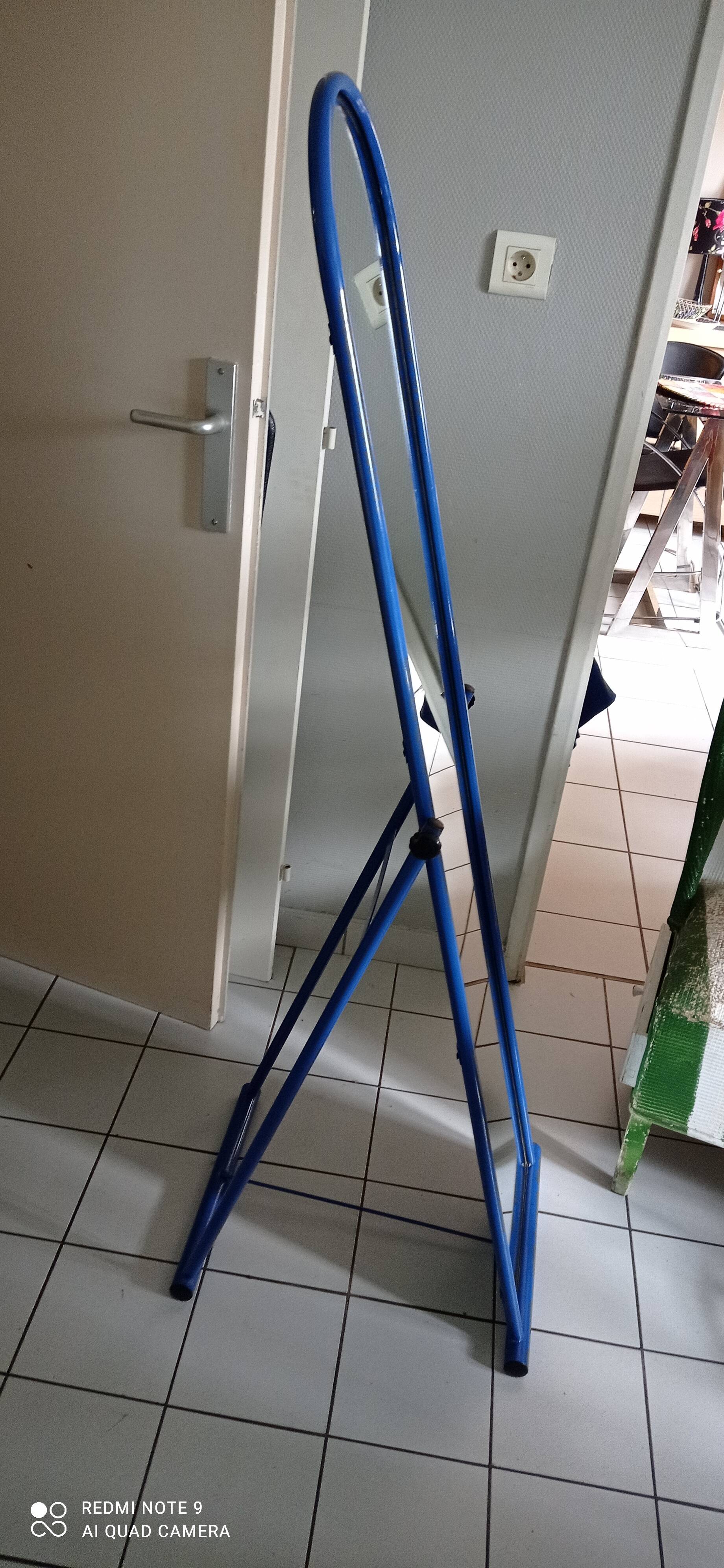Adjustable mirror on vintage blue tubular structure stand