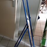 Adjustable mirror on vintage blue tubular structure stand