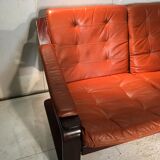 Wooden and ochre leather sofa