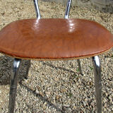 Suite of 4 skai and chrome chairs (total 5 chairs)