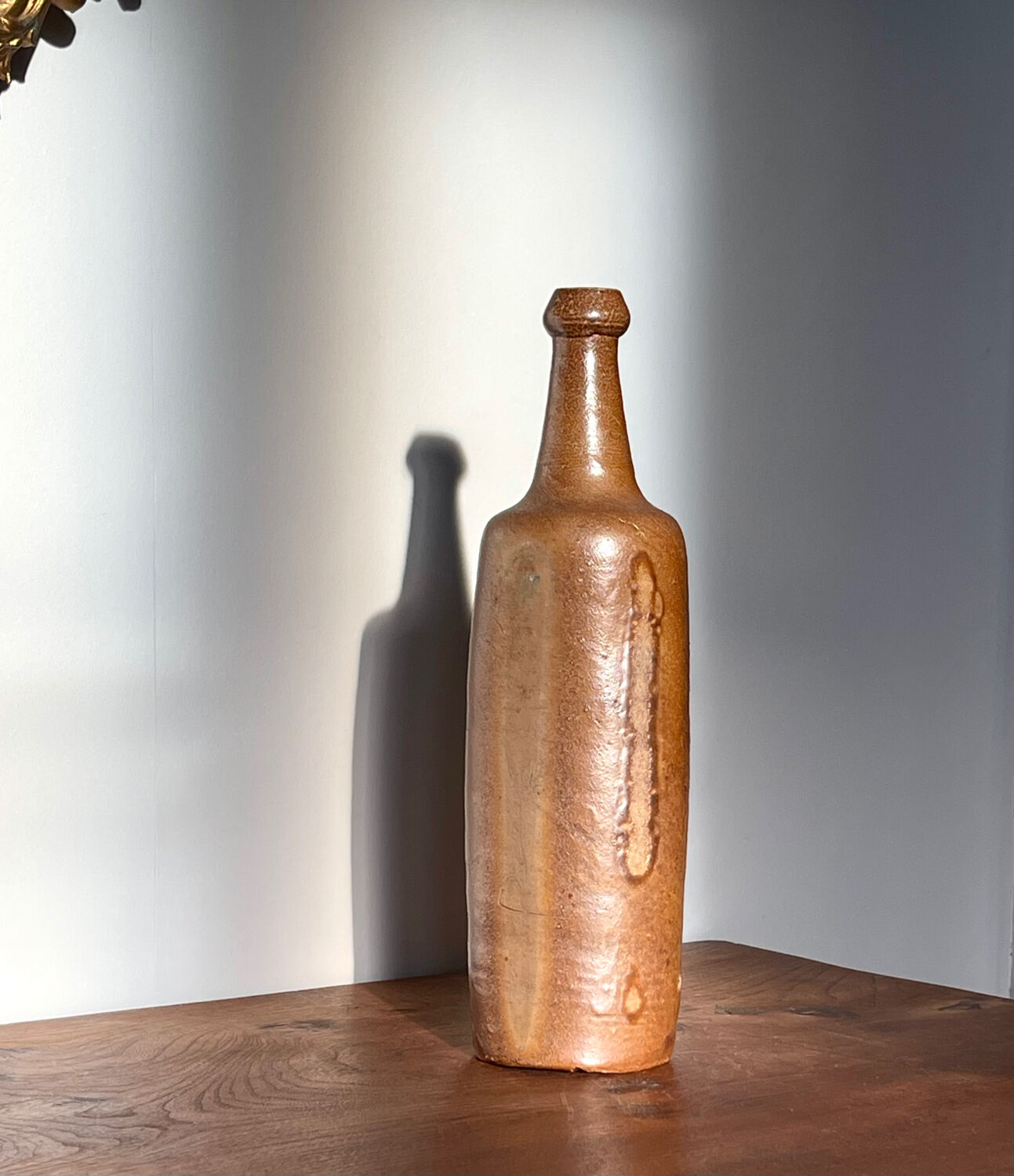 Antique stoneware bottle, 19th century.