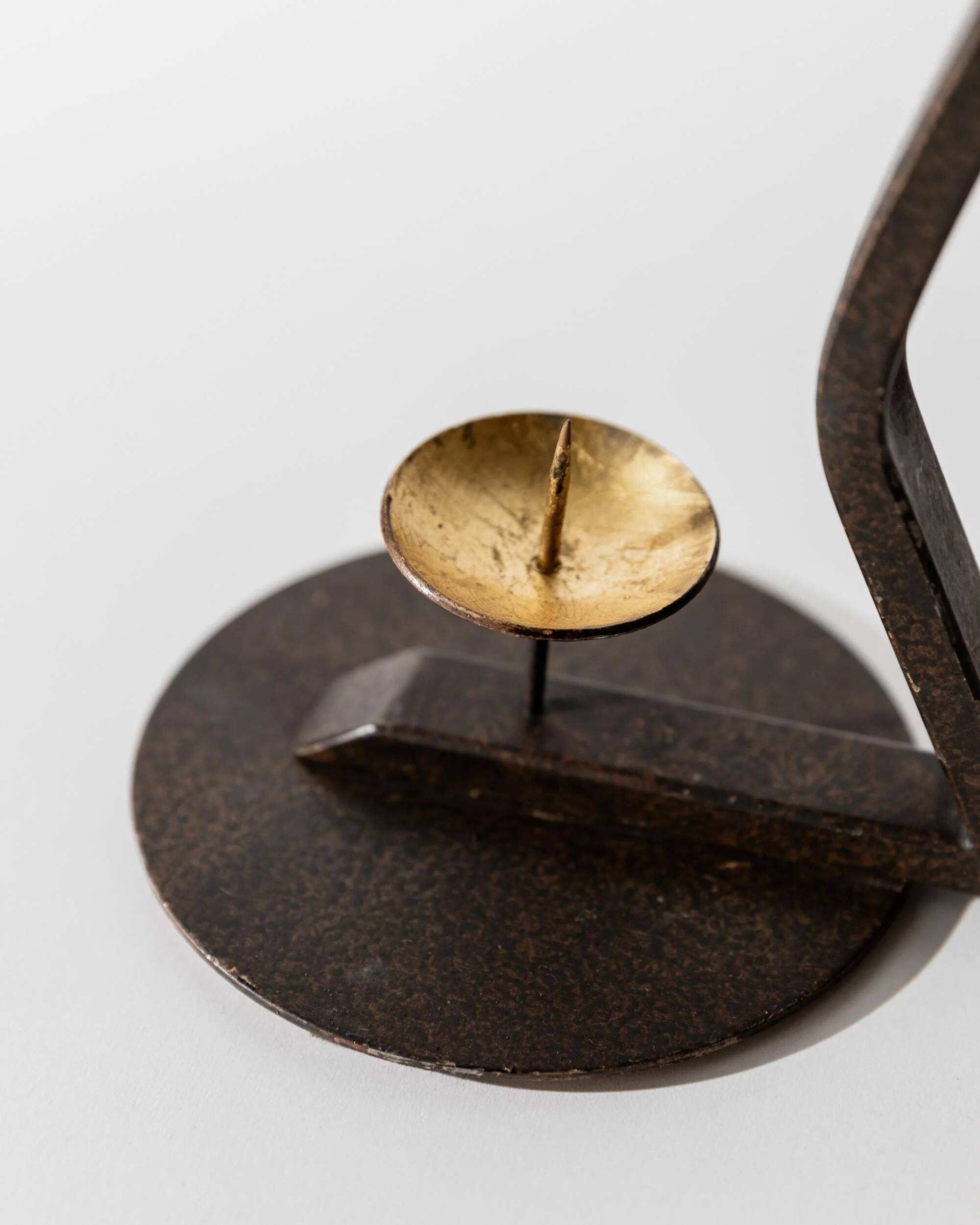 Vintage wrought iron candlestick from the 1960s, zigzag design with removable snuffer.