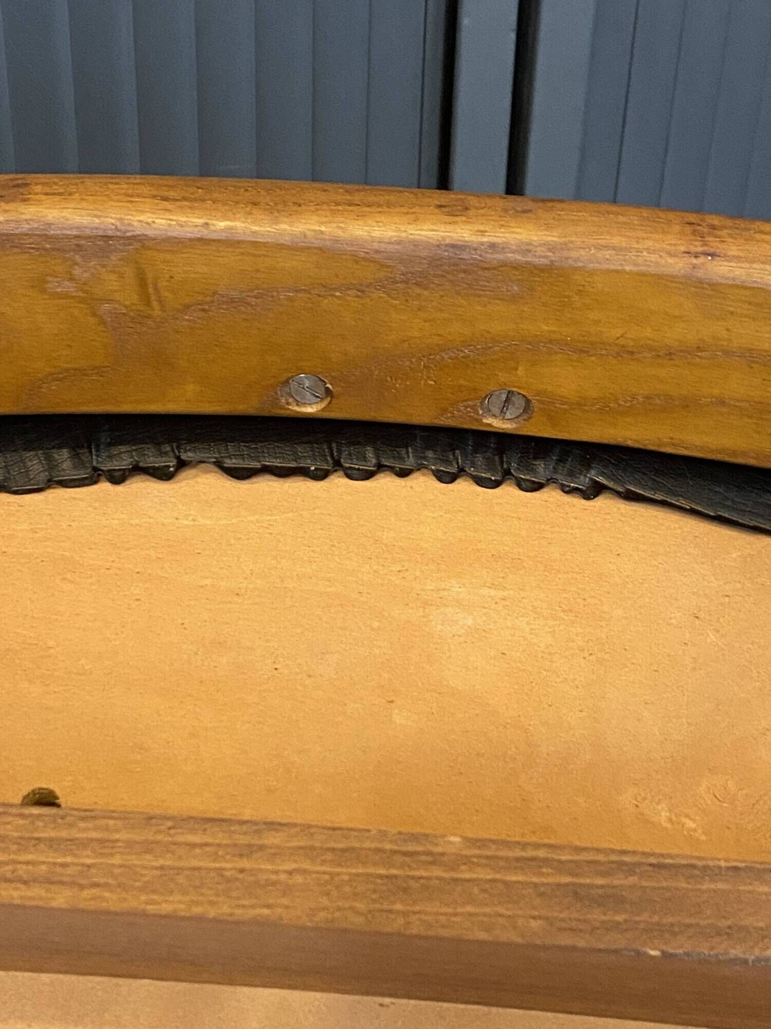 A Scandinavian teak skai chair from the 1960s for a vintage desk table.