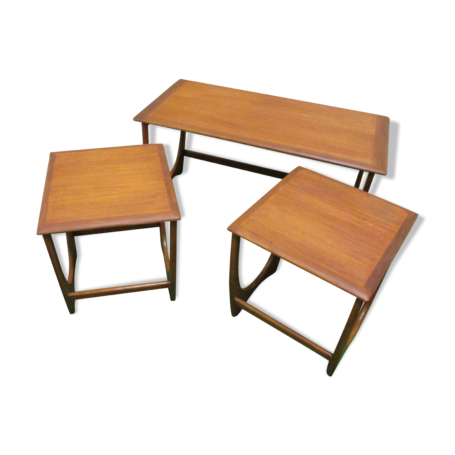 Nesting coffee tables in teak