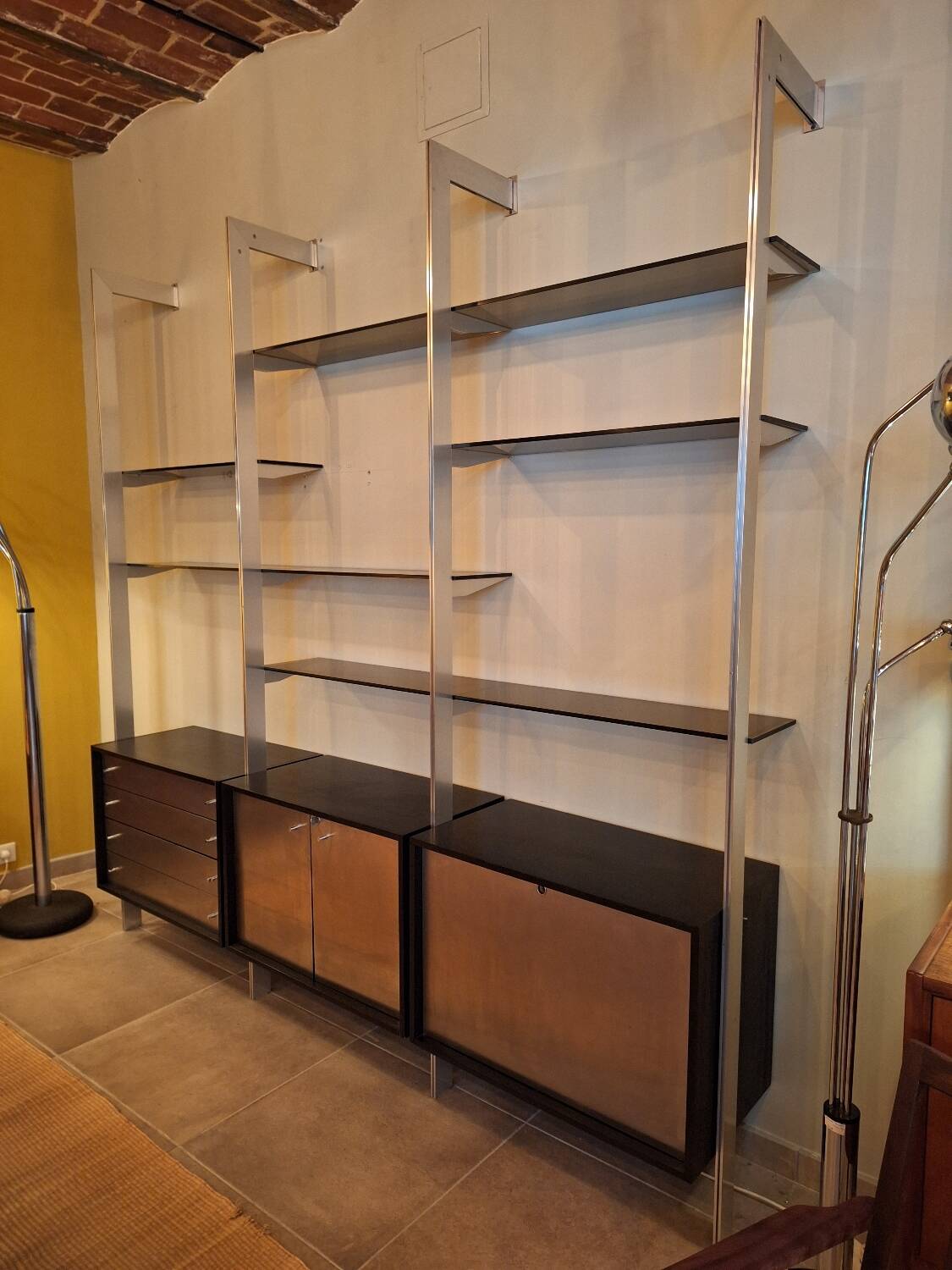 Wall shelves in wood, stainless steel and glass Roche Bobois