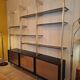 Wall shelves in wood, stainless steel and glass Roche Bobois