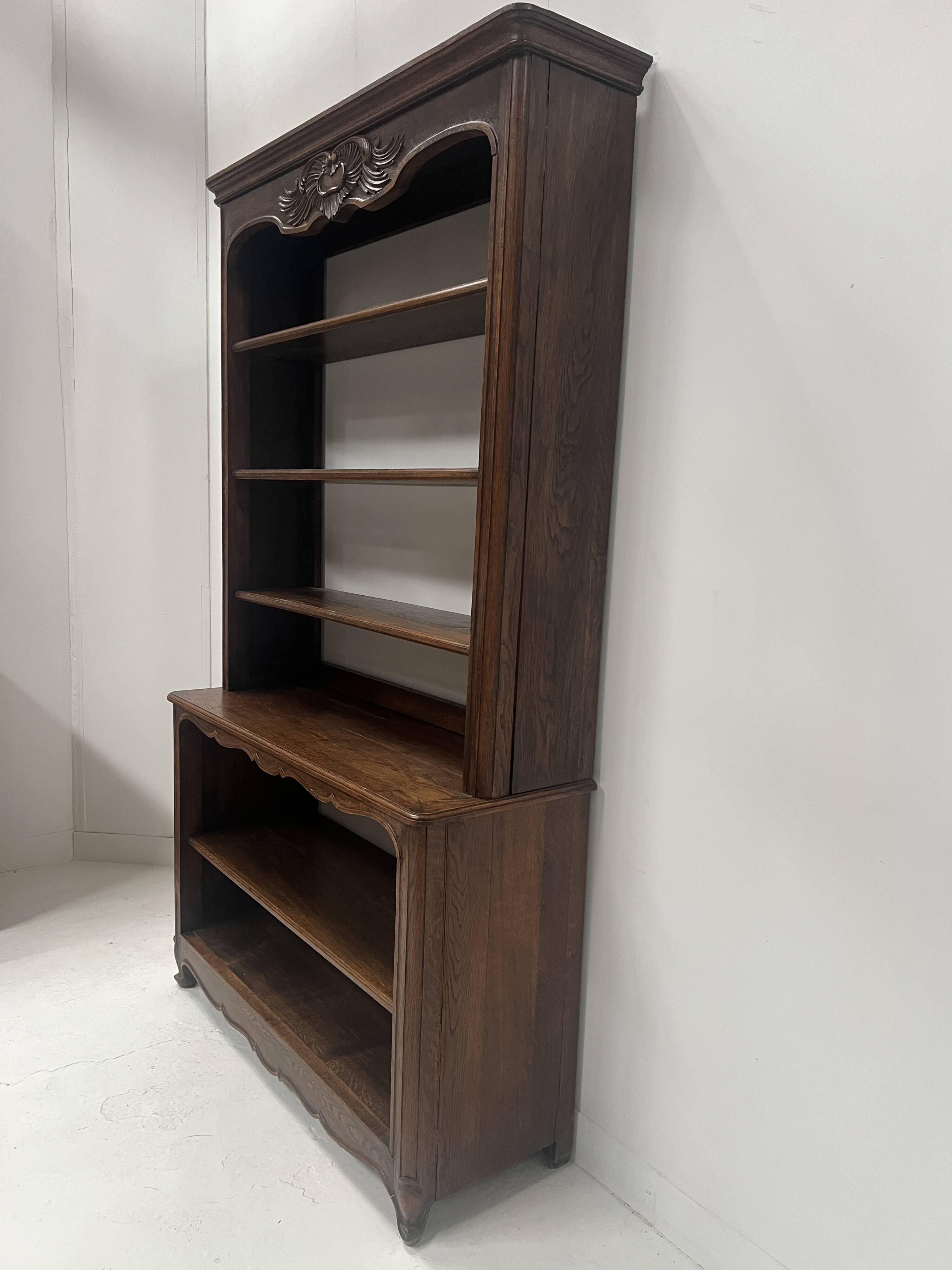 Wall library in two sections in Louis XV style made of solid oak, 20th century.