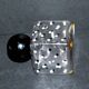 Vintage white and black polka dot glass perfume bottle and round bakelite cap