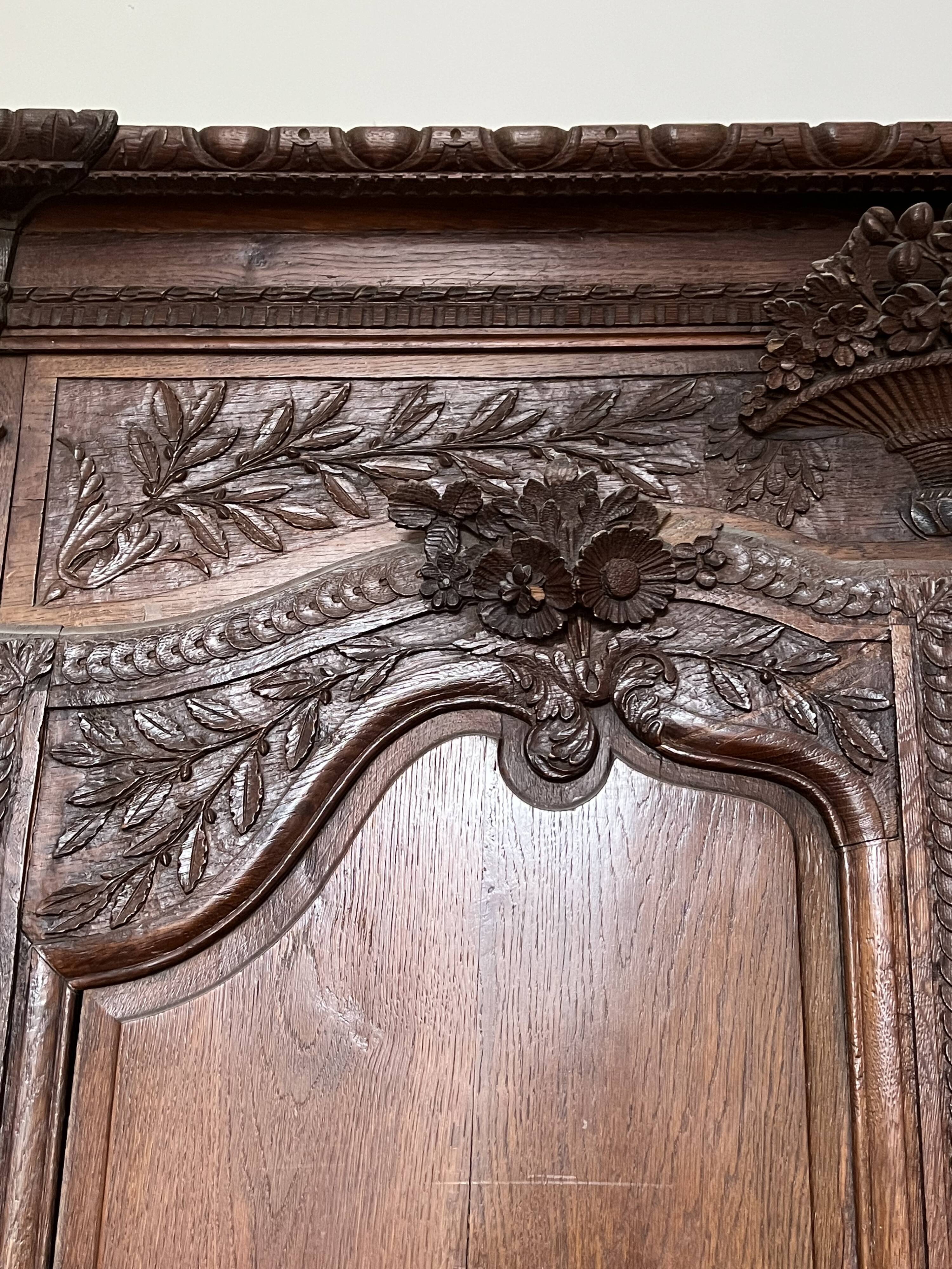 Beautiful and ancient Norman wedding wardrobe, richly carved