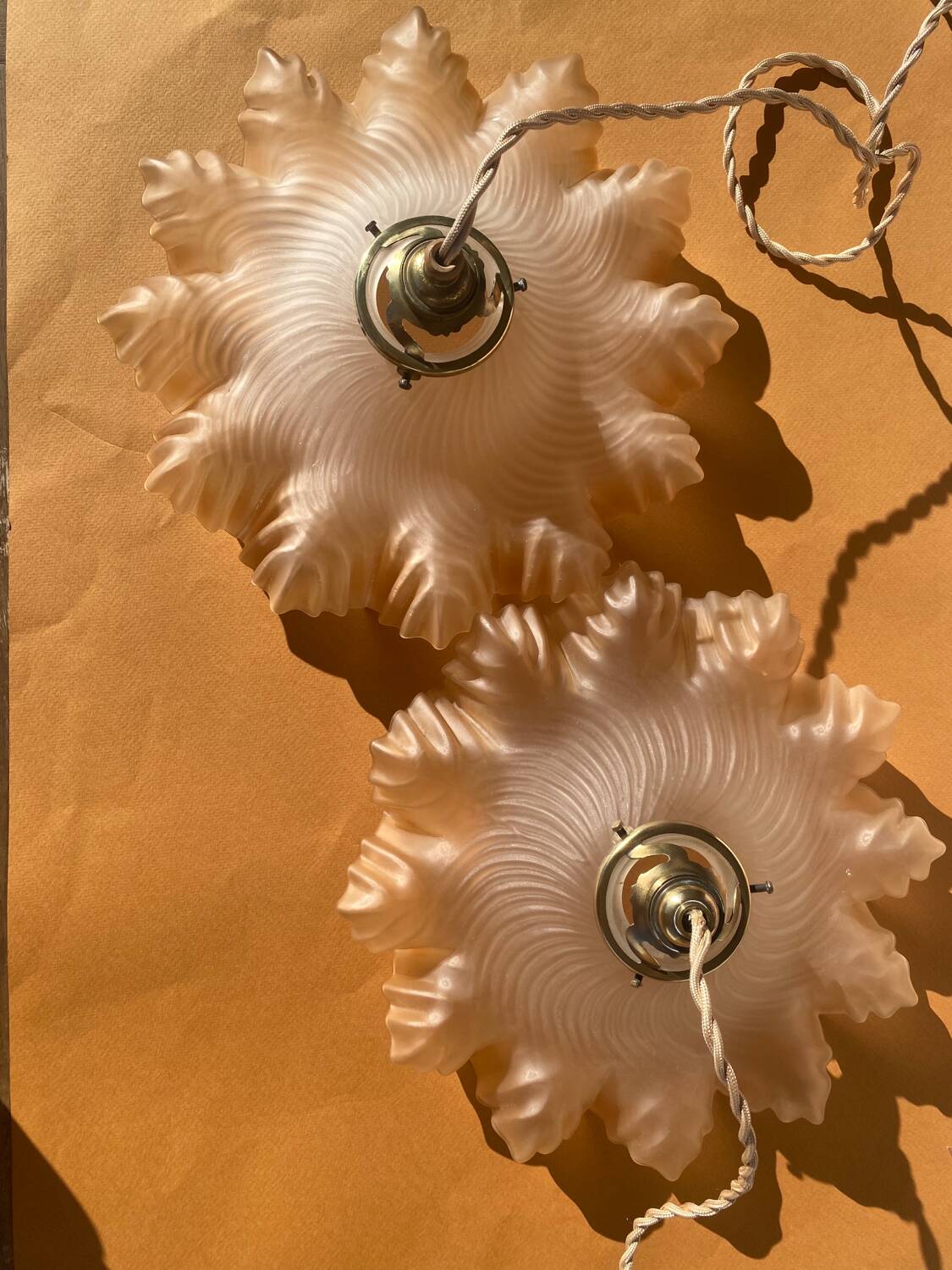 Pair of amber pendant lights