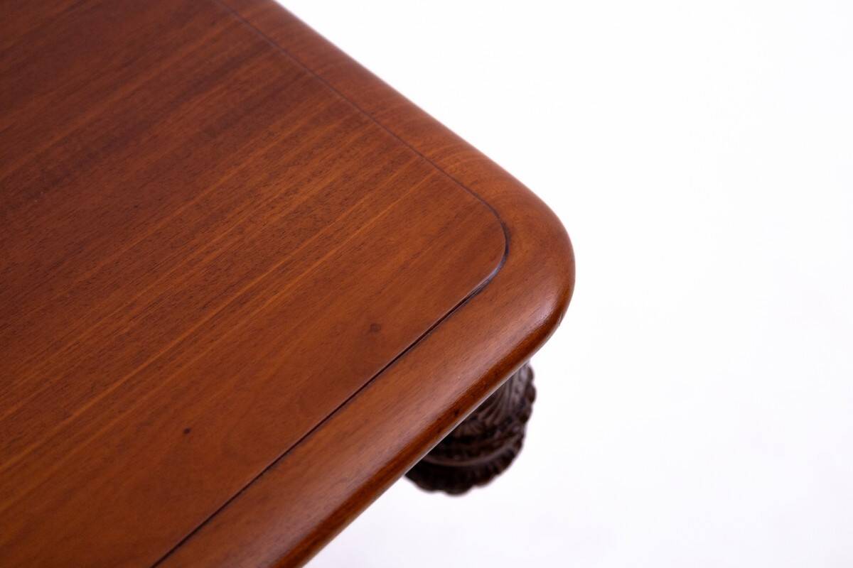 Late 19th century lion's paw table with chairs, Northern Europe.