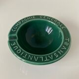 Beautiful ashtray of the Compagnie Générale Transatlantique in bottle green glazed earthenware