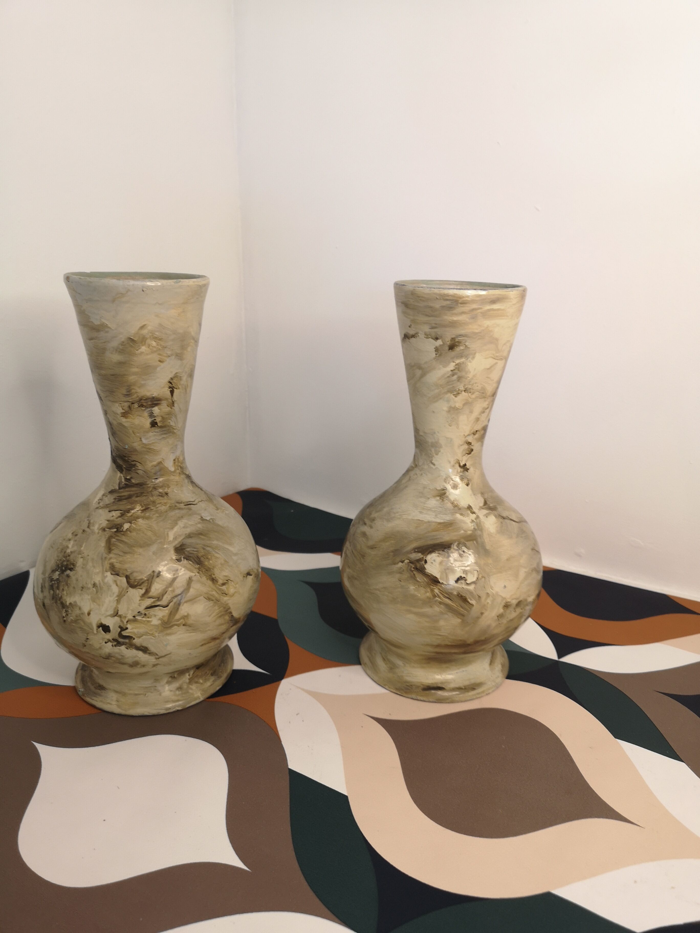 Pair of hand-painted terracotta vases