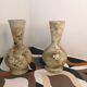 Pair of hand-painted terracotta vases