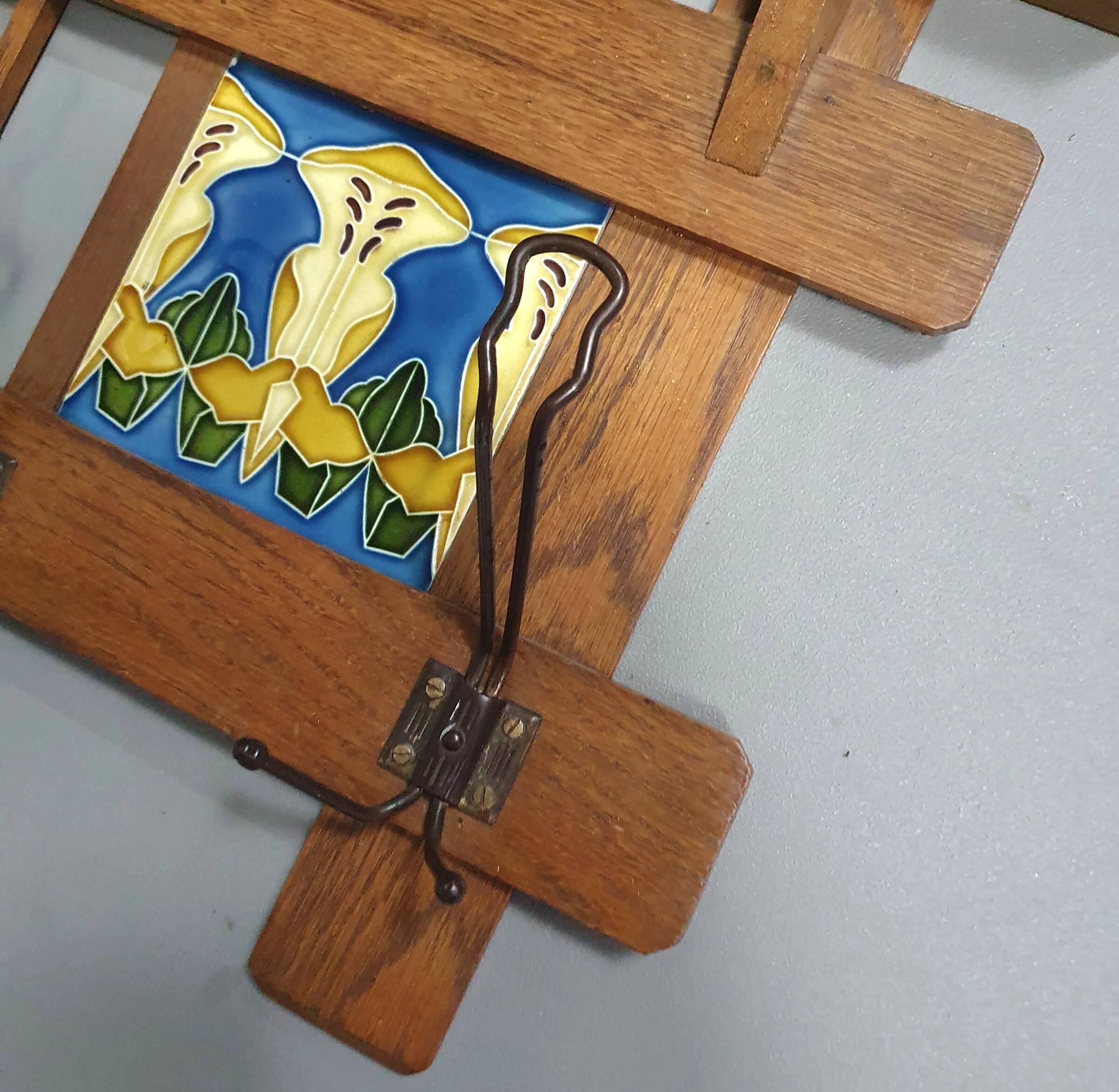 Art Nouveau wall coat rack with tiles