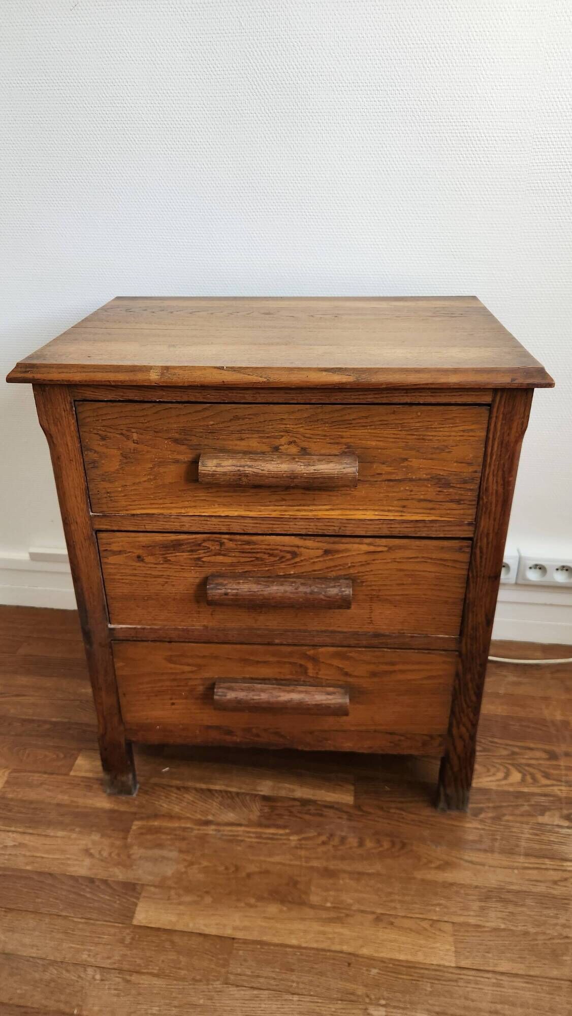 Beautiful old wooden furniture with three drawers.