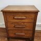 Beautiful old wooden furniture with three drawers.