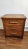 Beautiful old wooden furniture with three drawers.
