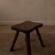 Vintage wooden stool in organic shape