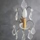 Antique tassel wall lamp in bronze and crystal