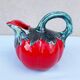 Red pitcher