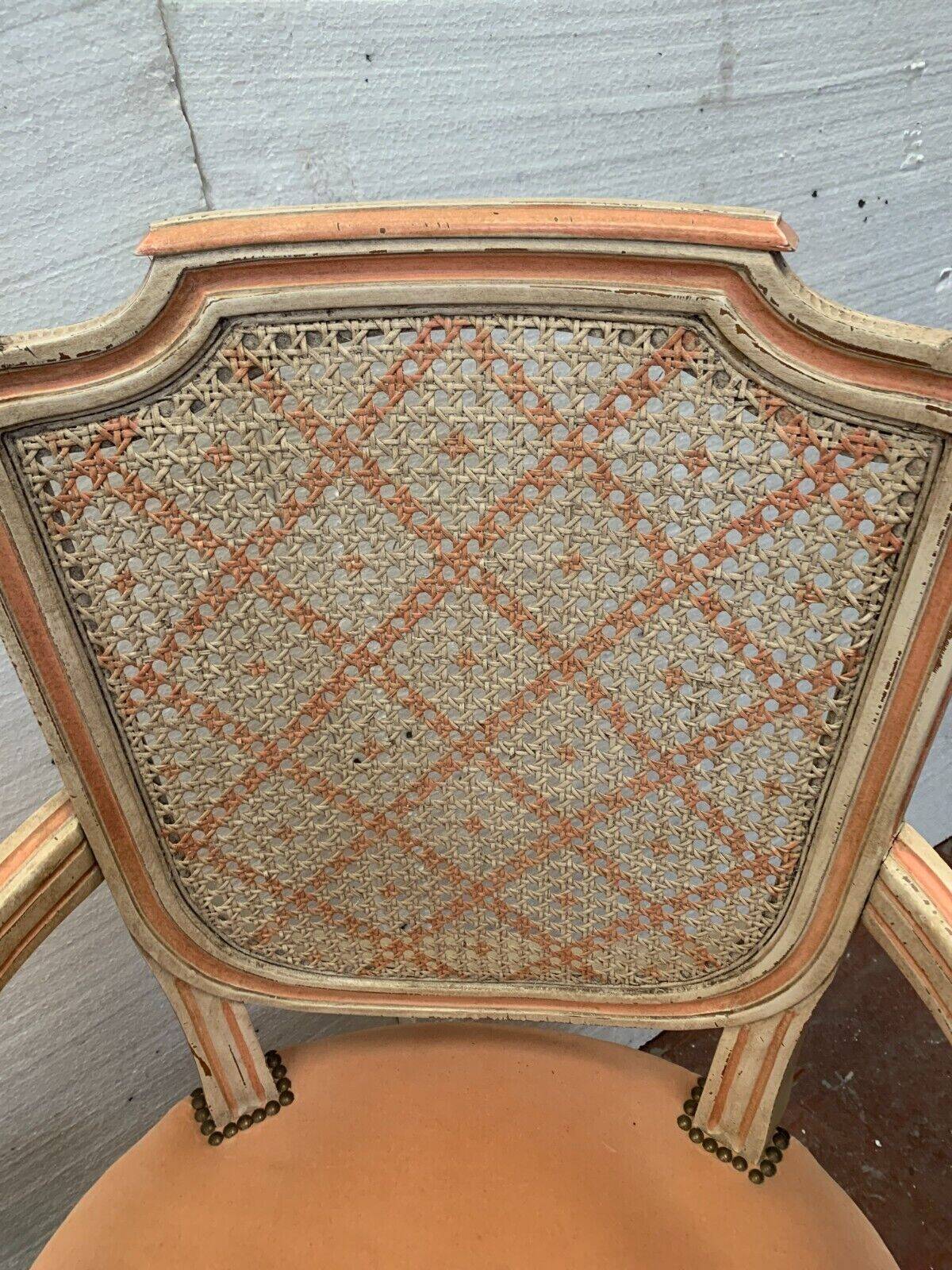 Pair of Louis XVI style armchairs in 20th century patinated beech