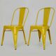 Pair of Tolix Chairs in yellow metal by Xavier Pauchard